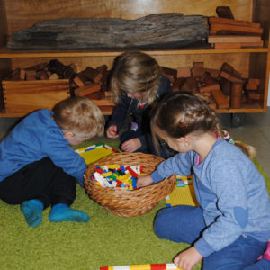 Children Playing With Lego